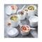 Pactiv Corp. 12 oz 3.75 in. Diameter x 3 in. h Paper Round Food Container and Lid Combo - White (250/Carton)